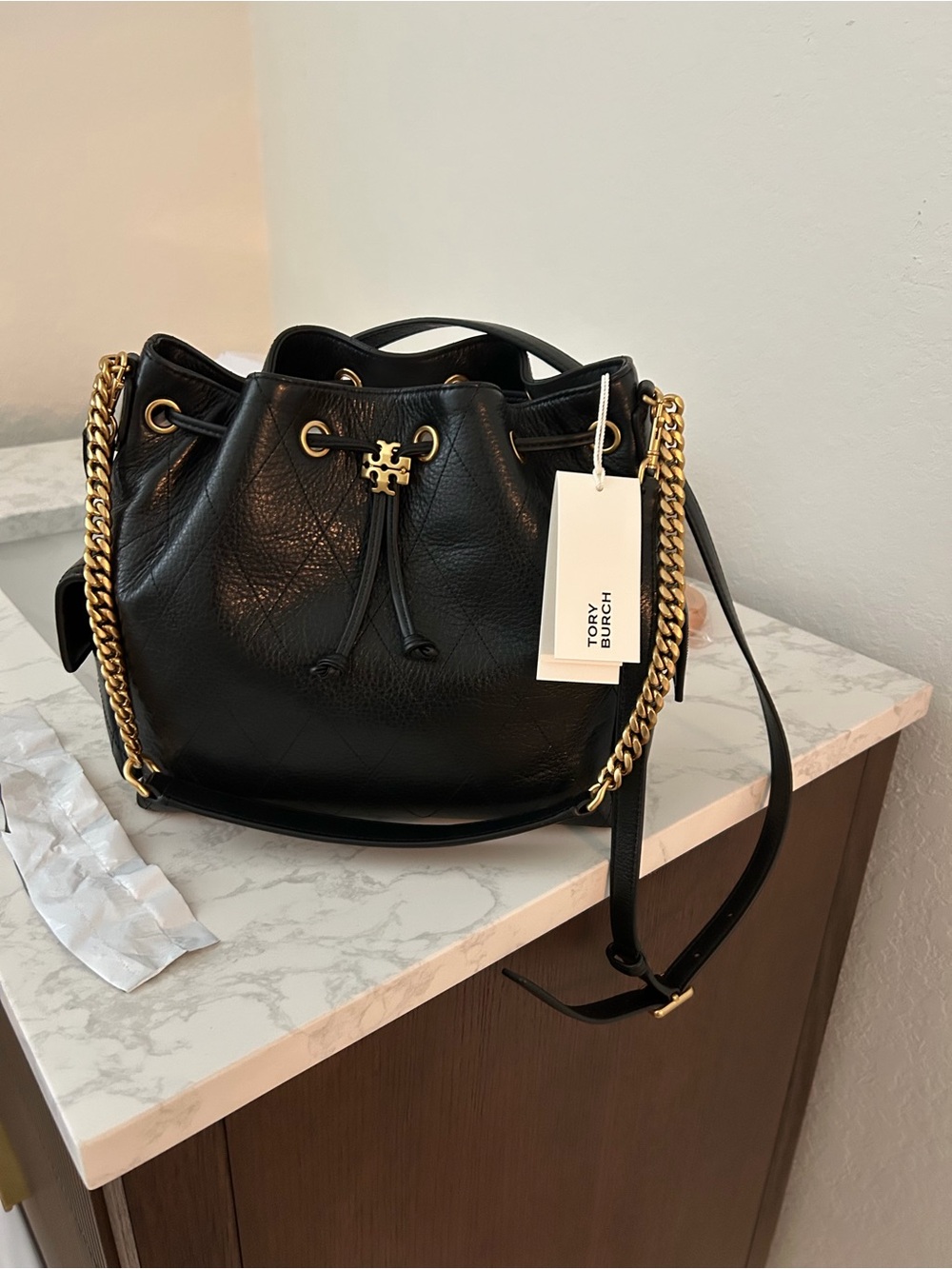 Tory Burch Black Pebbled Leather Drawstring Bucket Bag with Gold Chain